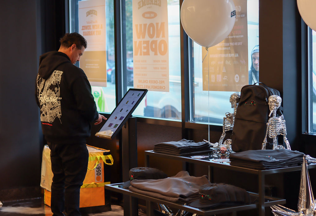 Customer browsing menu in a retail shop